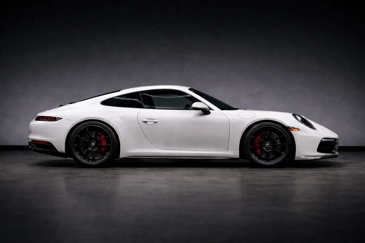 Vehicle before gloss grey color change wrap